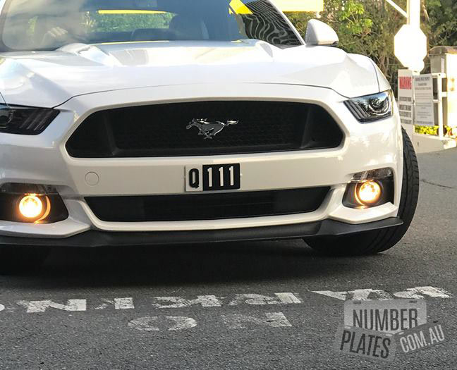 'Q111' on a Ford Mustang.