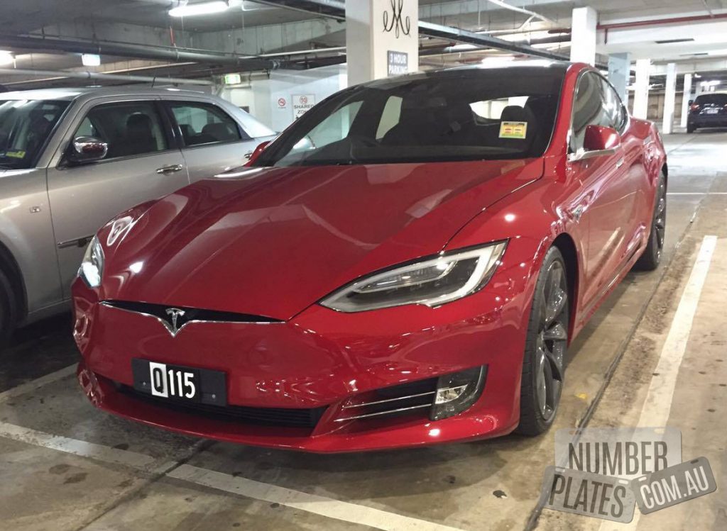 'Q115' on a Tesla Model S.