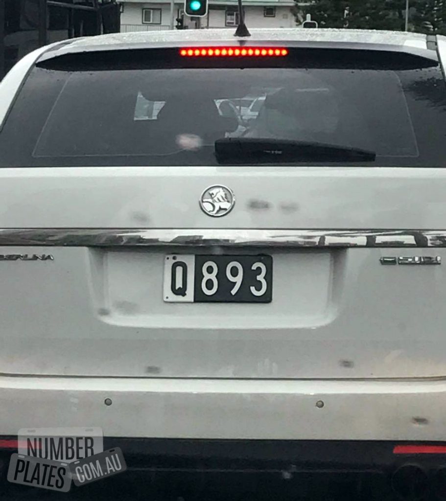 'Q893' on a Holden Commodore.